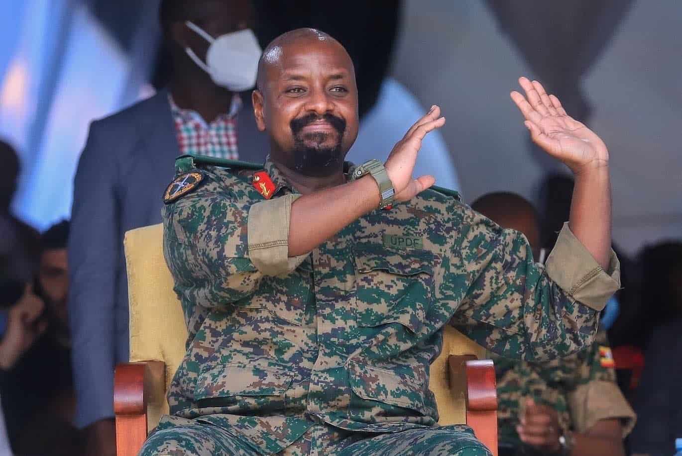 Kenyan military officer in uniform waving at KWETU NEWS event.