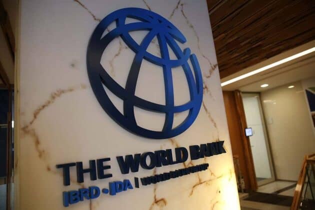 Modern logo of the World Bank Group at KWETU NEWS office entrance.